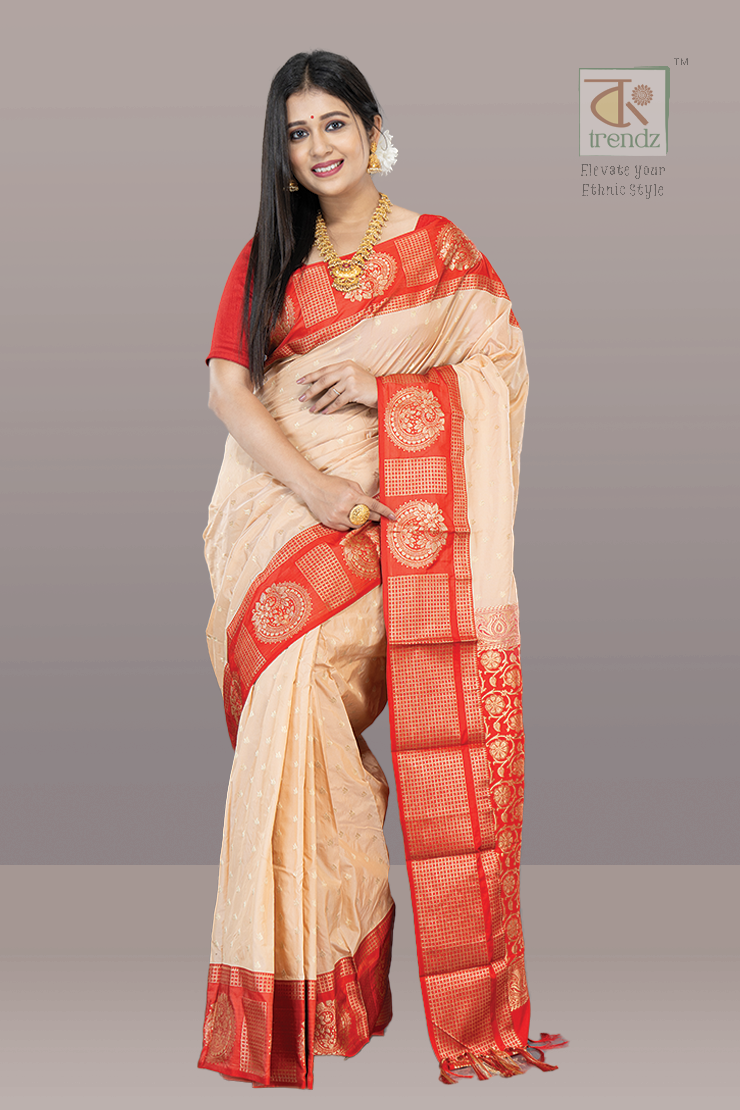 Off White Kanjivaram with Red base and Golden Zari weaving Pallu