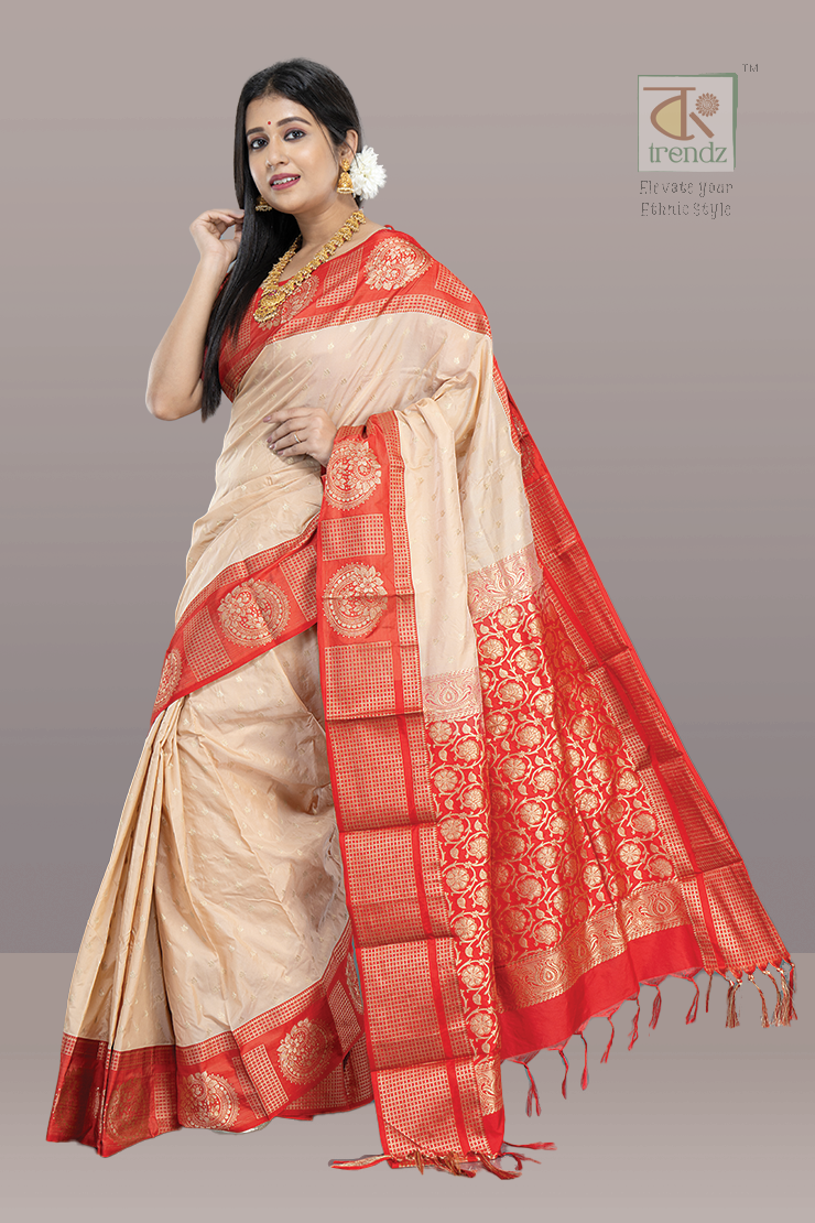 Off White Kanjivaram with Red base and Golden Zari weaving Pallu