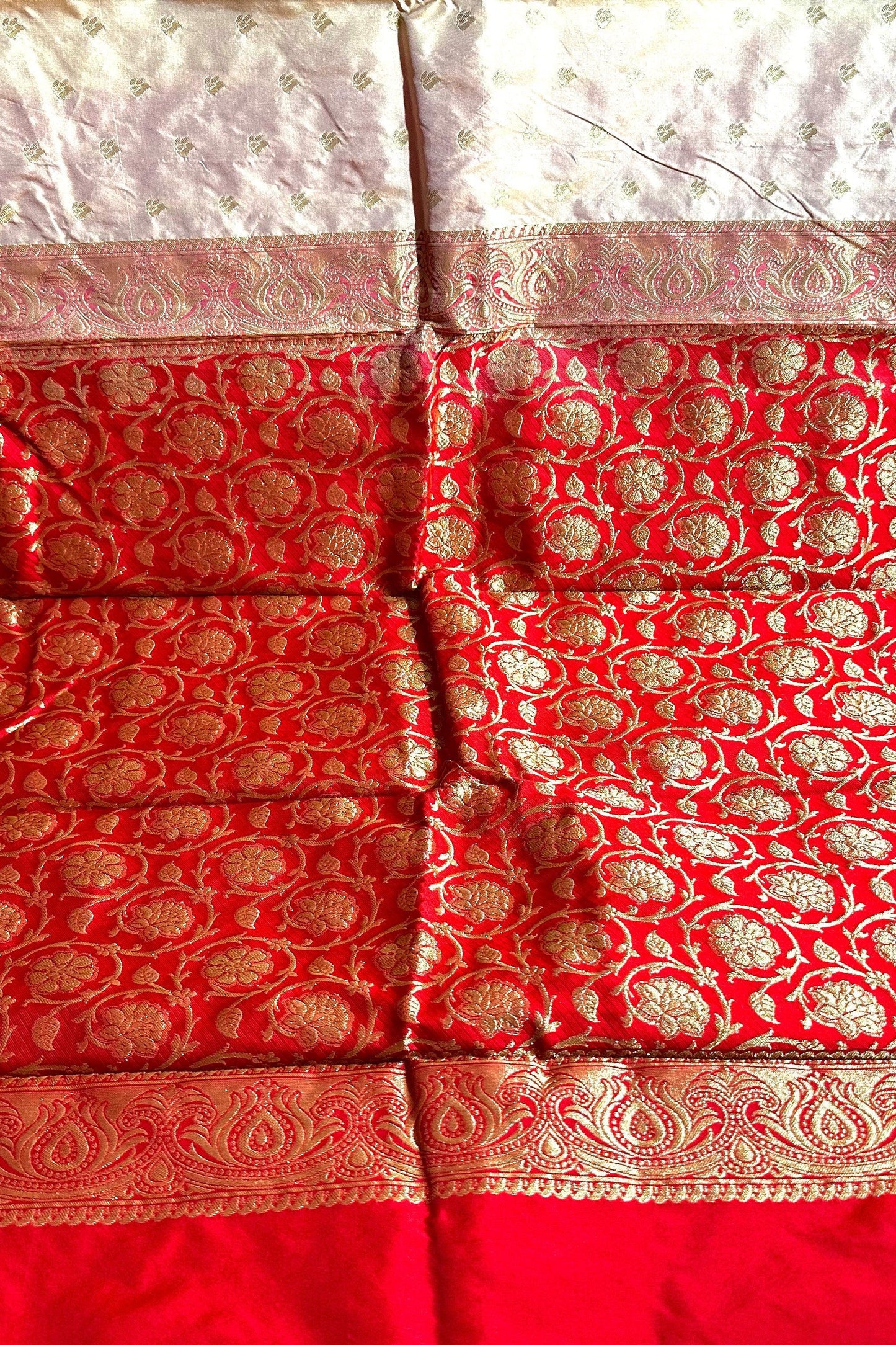 Off White Kanjivaram with Red base and Golden Zari weaving Pallu