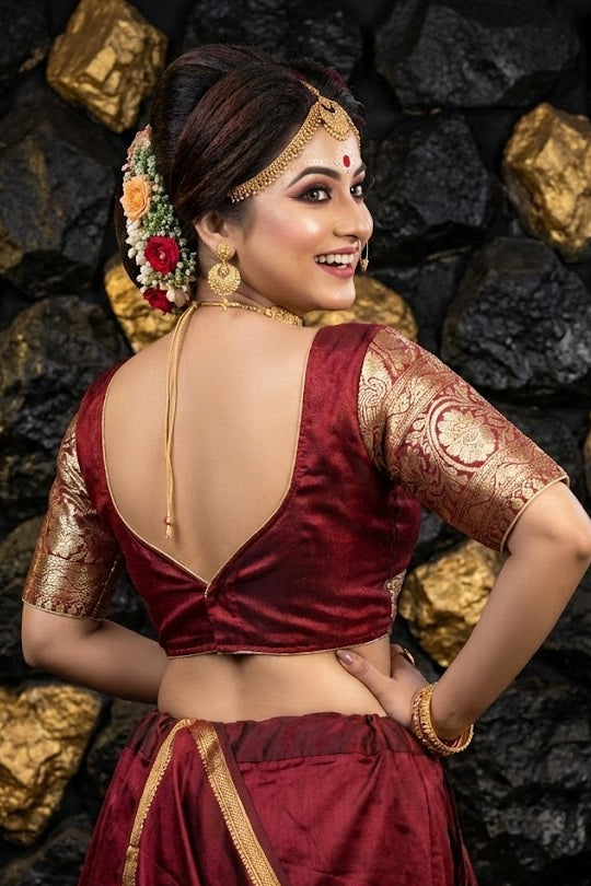 Sweetheart back design of red festive blouse with hook closure