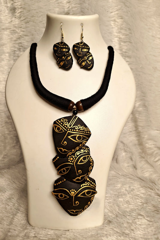 Durga Mukhosh terracotta pendant necklace and earrings set in black and gold - handcrafted Bengal goddess jewellery by Bong Trendz
