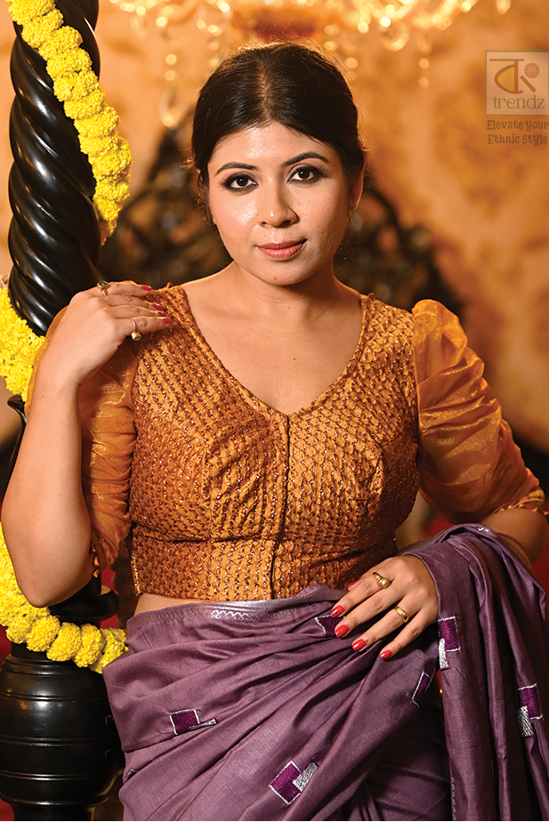 Golden zari silk blouse with long puff sleeves and sweetheart neckline front view