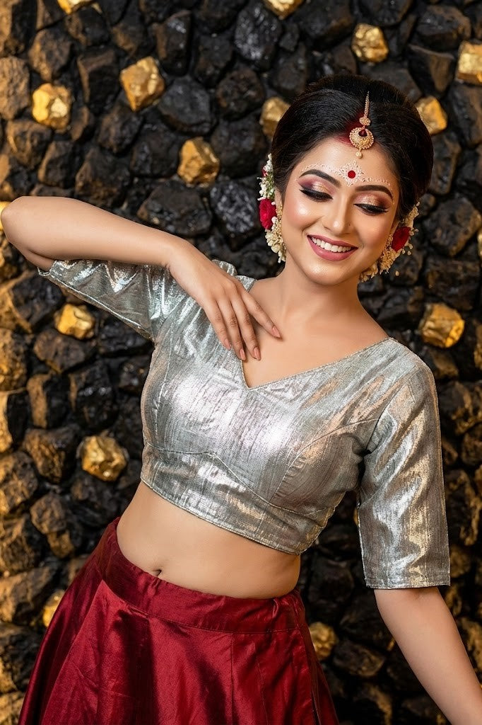 Front view of metallic silver cotton silk blouse with deep sweetheart neckline and padded bust.