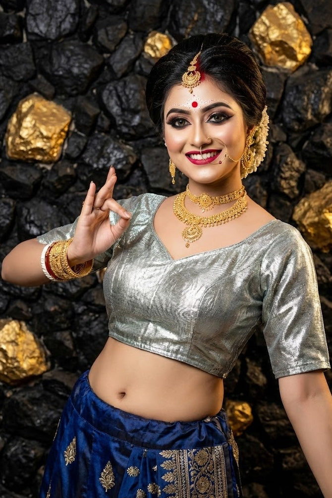 Front view of metallic silver cotton silk blouse with deep sweetheart neckline and padded bust.