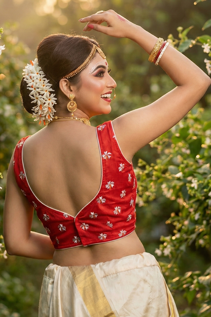 Back view of designer cotton blouse featuring deep sweetheart back design and secure back hook closure.