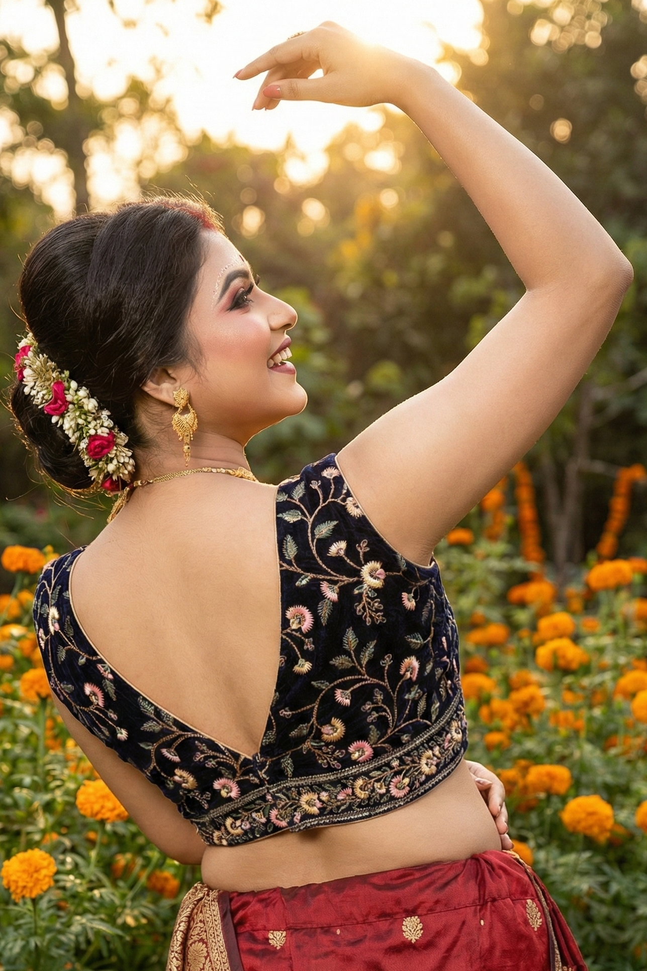 Sleeveless velvet saree blouse with floral embroidery and plunge neckline black blouse