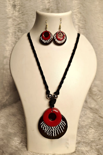 Alternate angle of layered terracotta sun disc medallion pendant in crimson and espresso brown - Bong Trendz