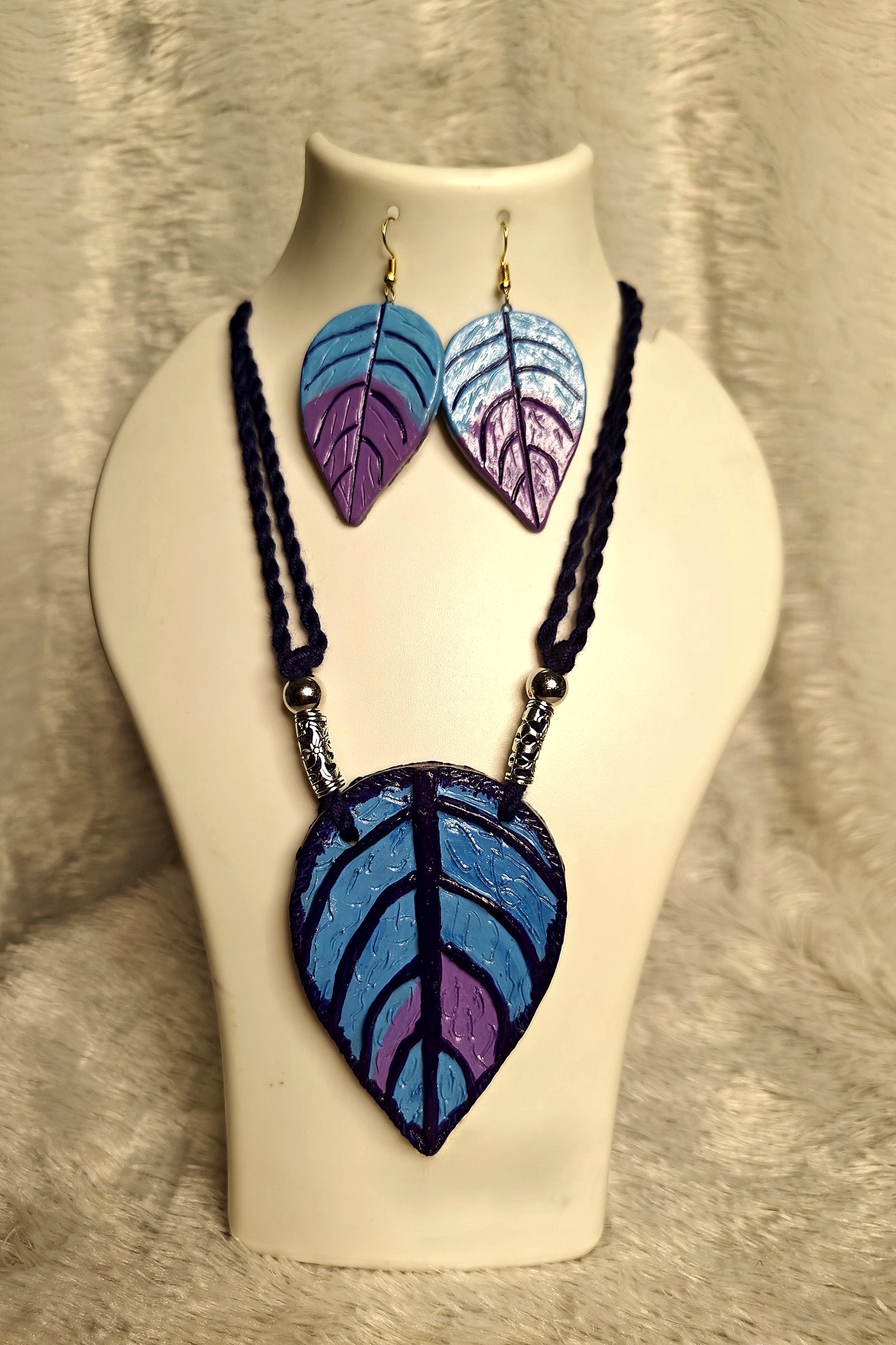 Alternate angle of hand-painted terracotta leaf pendant in ocean blue-purple ombre finish - Bong Trendz