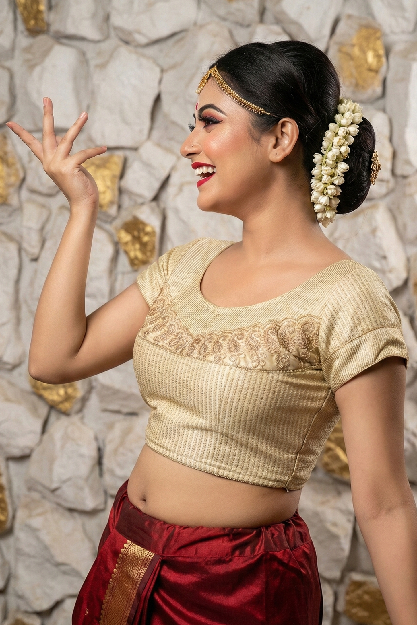 Side profile of short sleeve zari embroidered blouse showing texture