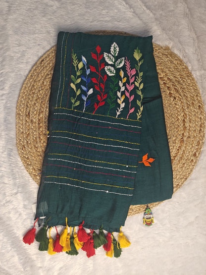 Bottle green Belpotra pure mul cotton saree flatlay with bullion stitch bael leaf embroidery and colourful tassels