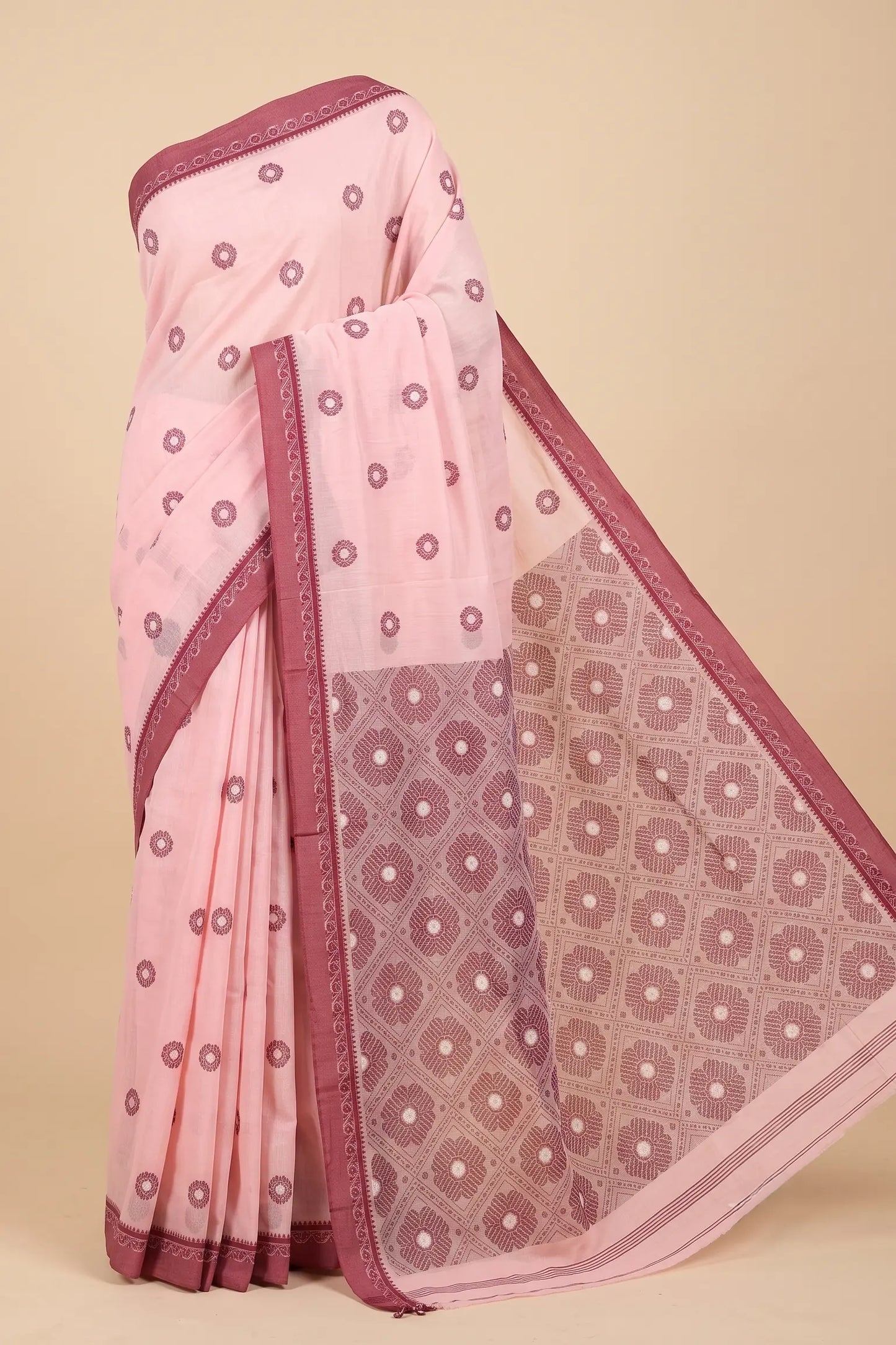 Side drape view of Dusty Rose Jamdani handloom cotton saree with maroon border, featherlight fall
