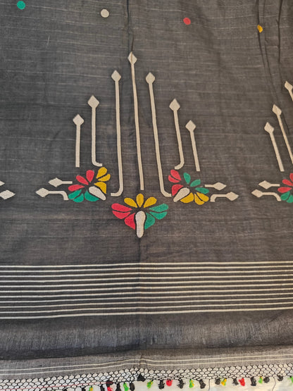 Black handloom cotton Jamdani saree – silver zari border and anchal detail