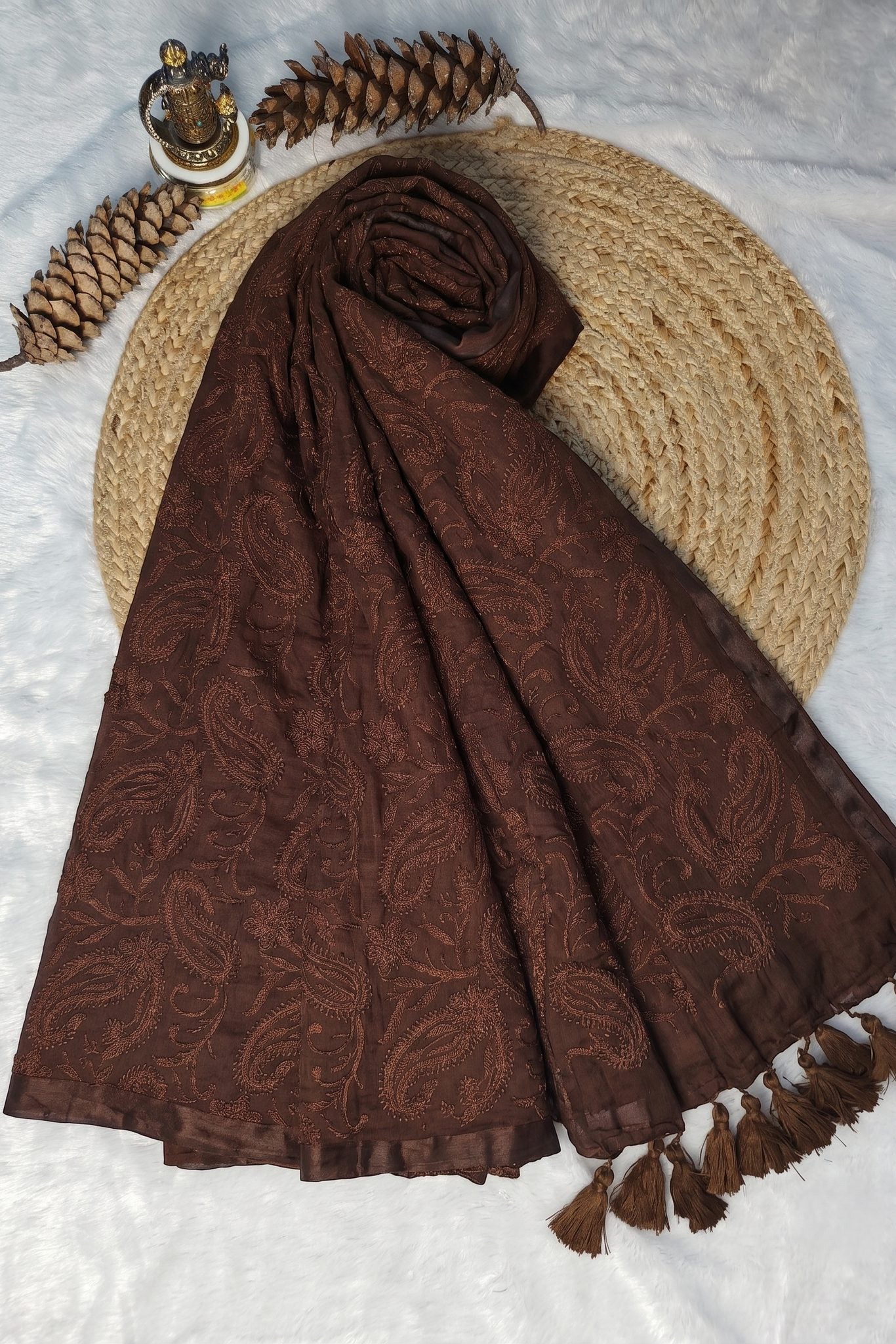 Brown chikankari mul cotton saree – tone-on-tone paisley embroidery detail