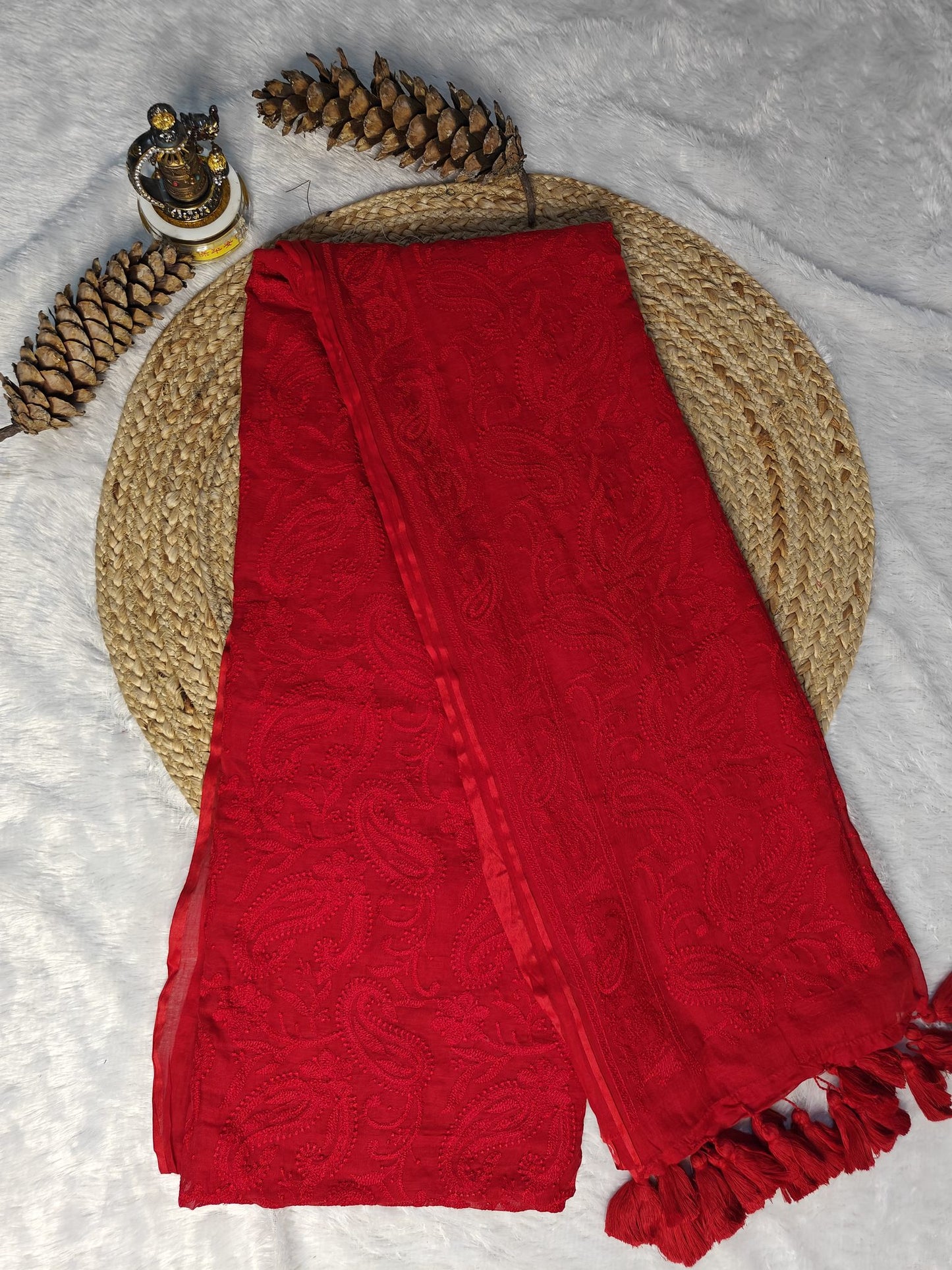 Red chikankari mul cotton saree – product flat lay