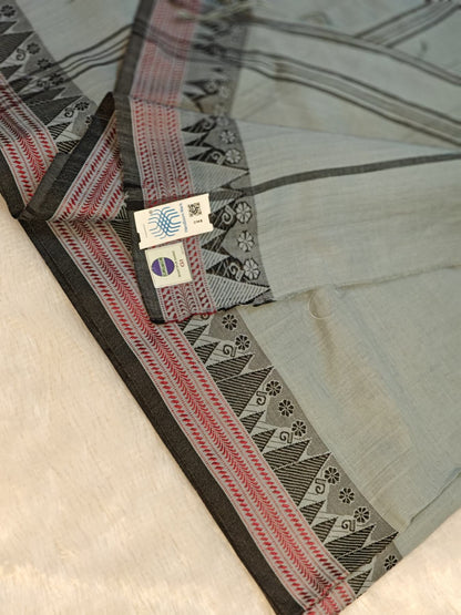 Konika grey Shantipur cotton saree GI tag and Handloom Mark label close-up, real product photo
