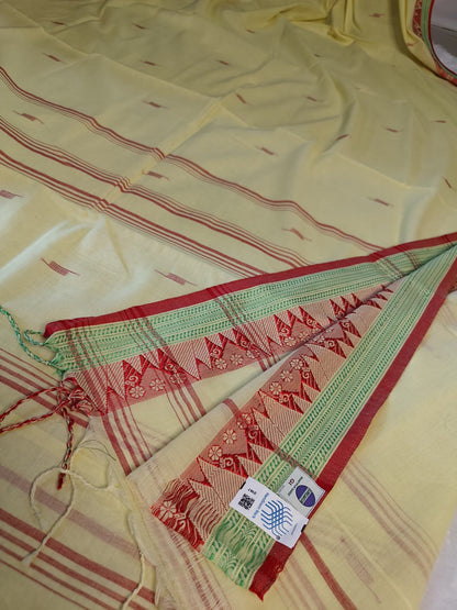 Konika yellow Shantipur cotton saree GI tag and Handloom Mark label close-up, real product photo